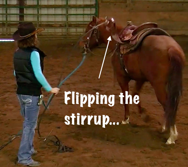 Stacy Westfall sacking Jac out using the saddle stirrup
