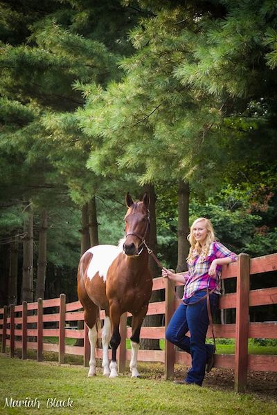 Maddie's senior picture with her, now grown, nurse mare foal from Last Chance Corral.